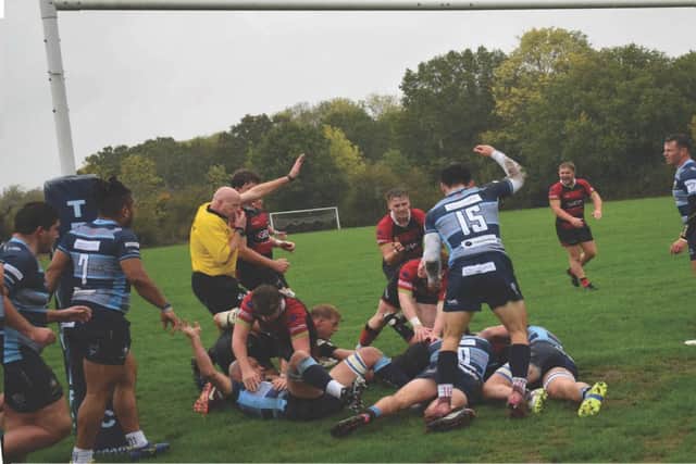 Harry Clark dives over to score the opening try for Heath