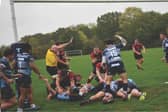 Harry Clark dives over to score the opening try for Heath
