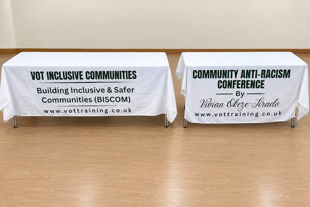 Table cloth displaying the name of CIC and describing the conference.