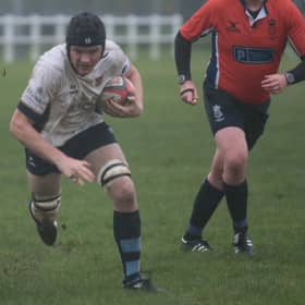 Dan Heriot scoring Blues' first try.