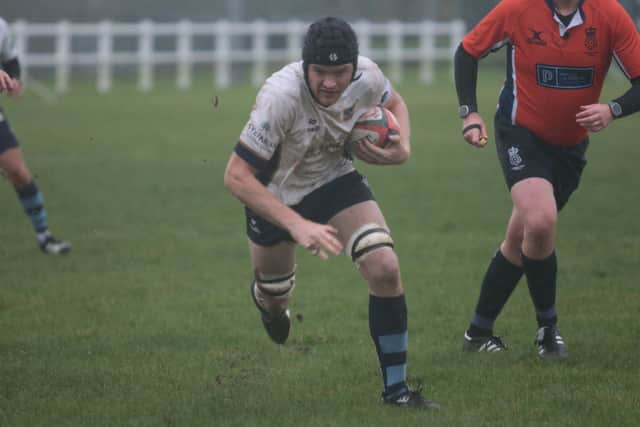 Dan Heriot scoring Blues' first try.