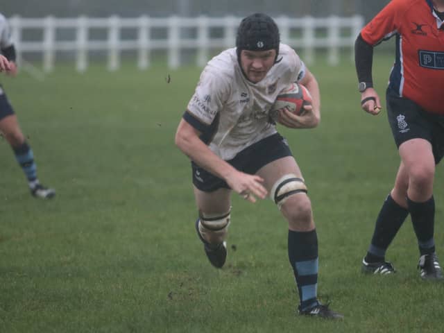 Dan Heriot scoring Blues' first try.