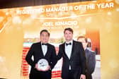 Louis Alexander presenting Joel Ignacio with his award