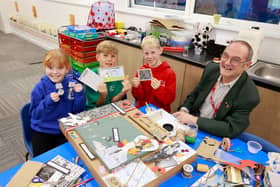 L-R Pupils at Langney Primary Academy and Richard Goldsmith, Hailsham Historical Society