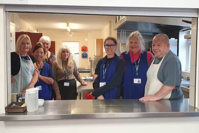 Charles Hunt Centre Age UK Sussex volunteers ready to serve you lunch