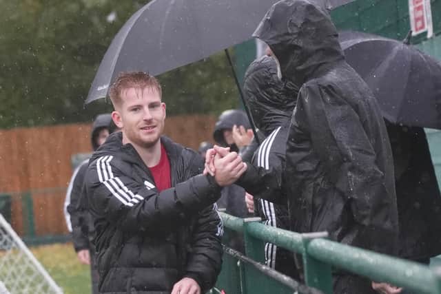 Joe Bull thanks the travelling Hassocks support after a 3-0 win at Forest Row played out in the middle of Storm Boelo