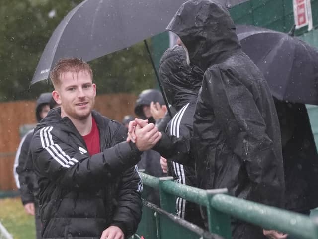 Joe Bull thanks the travelling Hassocks support after a 3-0 win at Forest Row played out in the middle of Storm Boelo