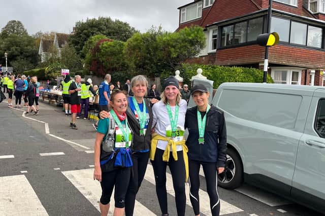 Lewes AC’s veteran women celebrate their medals after a testing 10k on the South Downs, with Jacqui Shepherd securing second place in her age category.