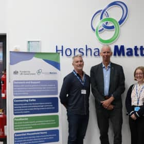 John Milne pictured with Kelvin Glen (CEO) and Alice (advisor)