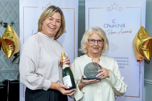 Sue Taylor-Hill gets her award