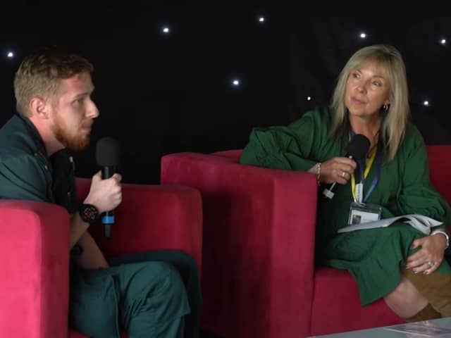 Cam Parfitt, from South East Coast Ambulance service, talks to Jane Crawford, Lead for the the Autism in Schools Project, at the Autistic and Wonderfully Wired conference.