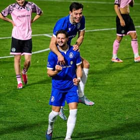Tom Caplin celebrates Roffey's third goal with Jack Meeres.