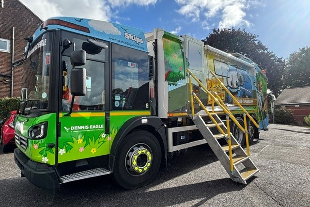 Dennis flies in to help teach children in the Chichester District about recycling