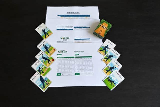 A selection of cards with the rules and scoresheet.