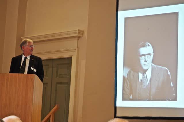 Alan Green talking with a picture of Richard Crossman MP, the Minister of Housing, whose idea in 1966 the studies were