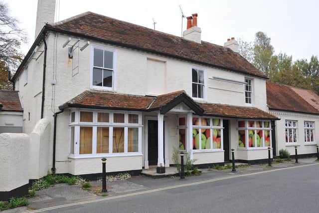 The former pub was converted into a food store but has now stood empty for two years