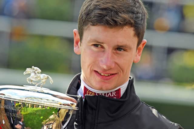 Oisin Murphy with his champion jockey trophy / Picture by Malcolm Wells