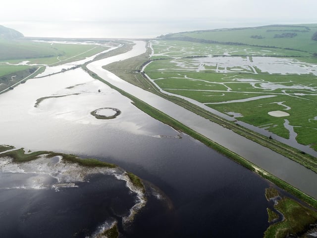 Cuckmere river flooding looking north to Exceat Bridge, Cuckmere Haven, Seaford