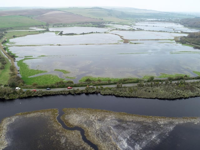 Cuckmere river flooding looking north to Exceat Bridge, Cuckmere Haven, Seaford