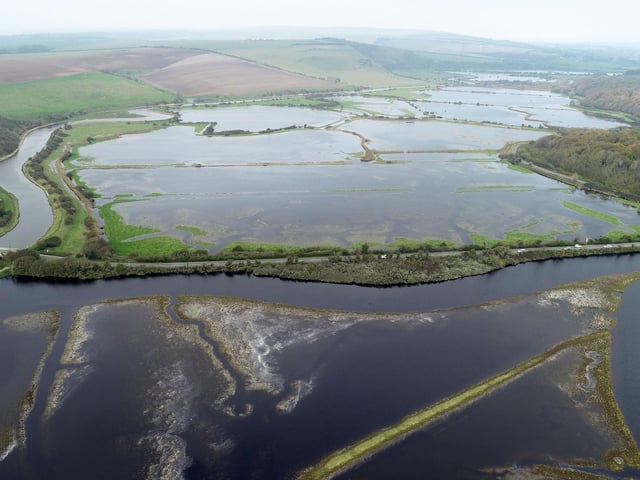 Cuckmere river flooding looking north to Exceat Bridge, Cuckmere Haven, Seaford