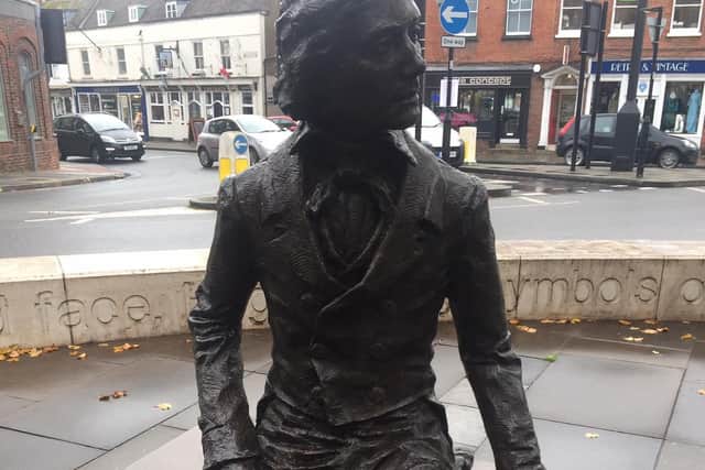 The sculpture of Keats outside the restaurant