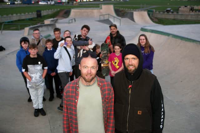 DM19110492a.jpg. Skateboarder James Peters wants to start a community centre with skateboarding, physical activity etc. Pictured at Lancing's Beach Green Skate Park, right, with David Odell and other users. Photo by Derek Martin Photography. SUS-190511-222103008
