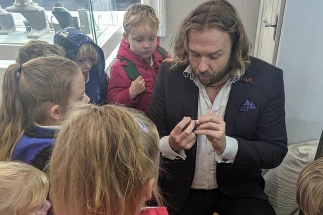 Petworth Primary School children visit Sam Newman from New Clarity Jewellery Shop SUS-190611-164158001