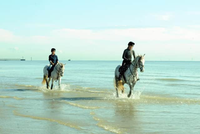 Another pair of riders on the beach in Climping