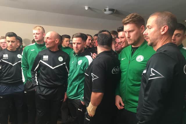 Chi City players and officials wait for the Cup draw