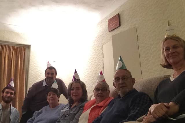 Baha'is and friends in their party hats