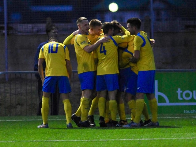 Lancing players celebrate