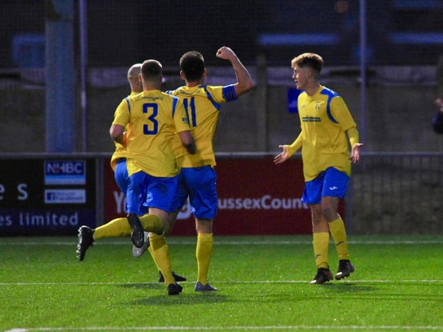 Lancing players celebrate