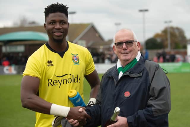Keeper Amadou Tangara receives the October player of the month award before Saturday's game / Picture by Tommy McMillan