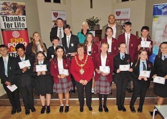 Worthing mayor Hazel Thorpe with the young debaters, judges Bob Smytherman and Toby Wilson, and Rotarian Kim Woodley