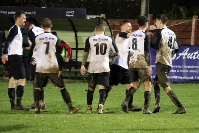 Pagham celebrate / Picture by Roger Smith