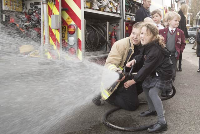 Pupils from Lewes Old Grammar School had the opportunity to use firefighting equipment during their visit, photo by Peter Whyte