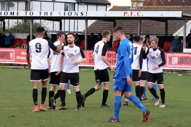 Pagham celebrate a goal v YMCA / Picture by Roger Smith