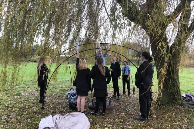 Year-nine students building a shelter as part of their expeditioning lessons