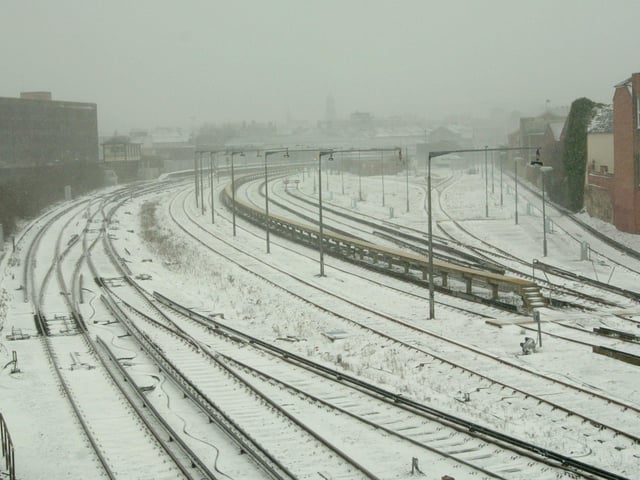 Deserted railway tracks from Eastbourne station in the snow, seen from Whitley Road bridge in March 2013