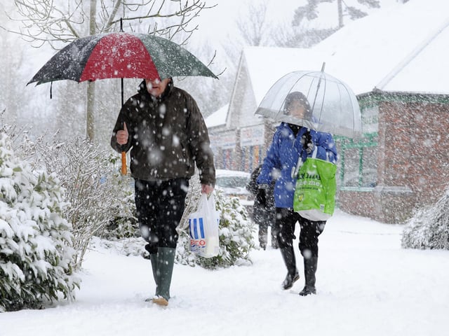 Braving the blizzard near Tesco Express in Burgess Hill in December 2010