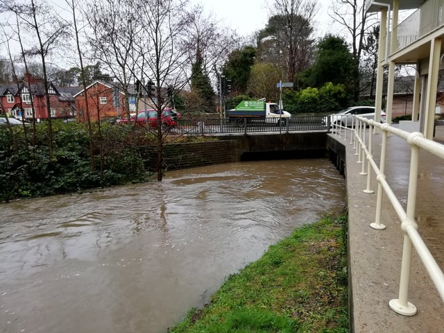 The water has nearly reached the bridge