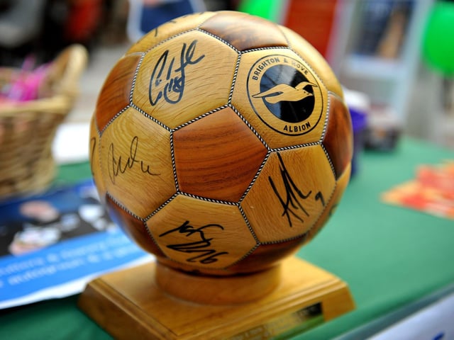 Guy Butters and Danny Cullip signing autographs and taking photos to raise money for St Peter and St James Hospice