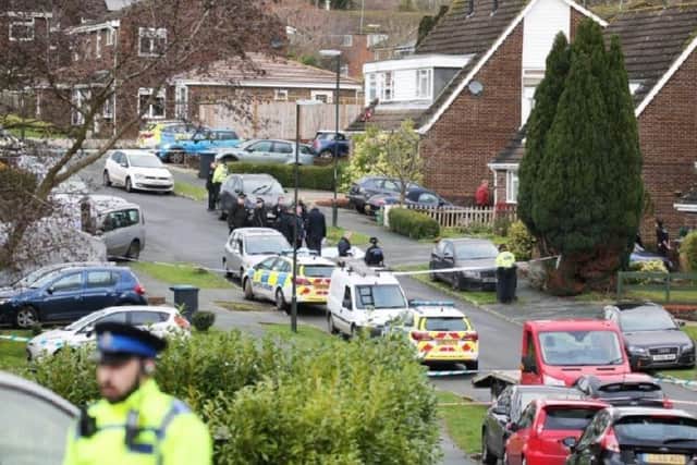 Police at the scene of a murder investigation in Hazel Way, Crawley Down SUS-191223-104139001
