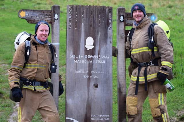 Shaun Challis and Lee Smith at the end of the South Downs Way. Picture: Dan Jessup
