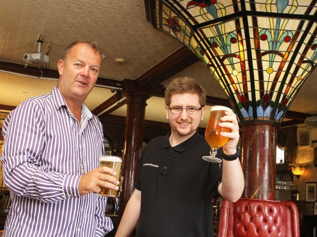 New manager Gary May with barman Josh Riley at the Grand Victorian Hotel in Worthing. Picture: Derek Martin DM1990017a