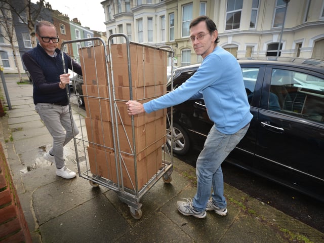 Surviving Christmas charity setting up on Christmas Eve at the Salvation Army hall in St Andrew's Sqaure, Hastings.Simon Hobson and Mark Lynn SUS-191224-110213001