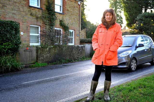 Janice Smith - Tower Hill road danger. Janice has to leave the only exit from her property and his just over a foot of space before she's on the blind bend of a busy road, where alot of cars travel too fast. Pic Steve Robards SR23121901 SUS-191223-162832001