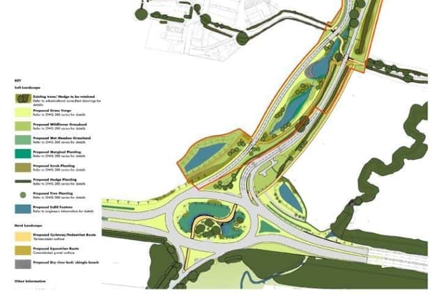 There are plans for a new roundabout linking the A264 with the north Horsham development of 2,750 new homes SUS-200301-125154001