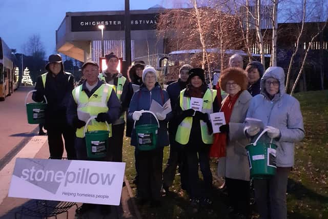 The carol singers raised thousands of pound fro Stonepillow with their singing outside performances of the Wizard of Oz at Chichester Festival Theatre