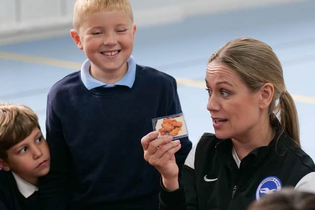 Albion nutritionist Mari Clark talks to primary school pupils about healthy eating at an Albion in the Community event in September. Photo by Stuart Butcher.